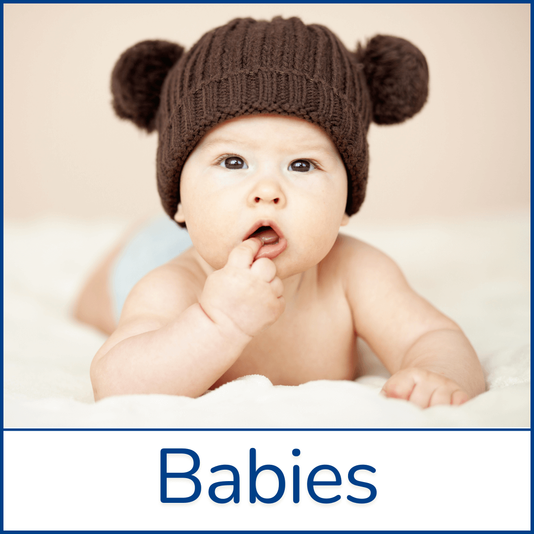 Cute baby in a knitted hat lying on a soft blanket, symbolizing newborn care, baby development, sleep, feeding routines, and parenting support for raising happy and healthy infants with love Baby care and newborn parenting tips | Development, sleep, feeding, and support for raising infants