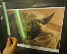 Pin the lightsaber onto Yoda just like pinning the tail on the donkey